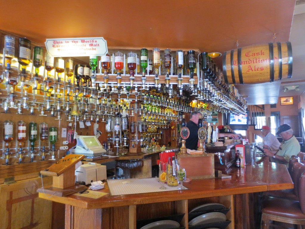 Single malt whiskies line the walls in the bar at Pint's Pub.