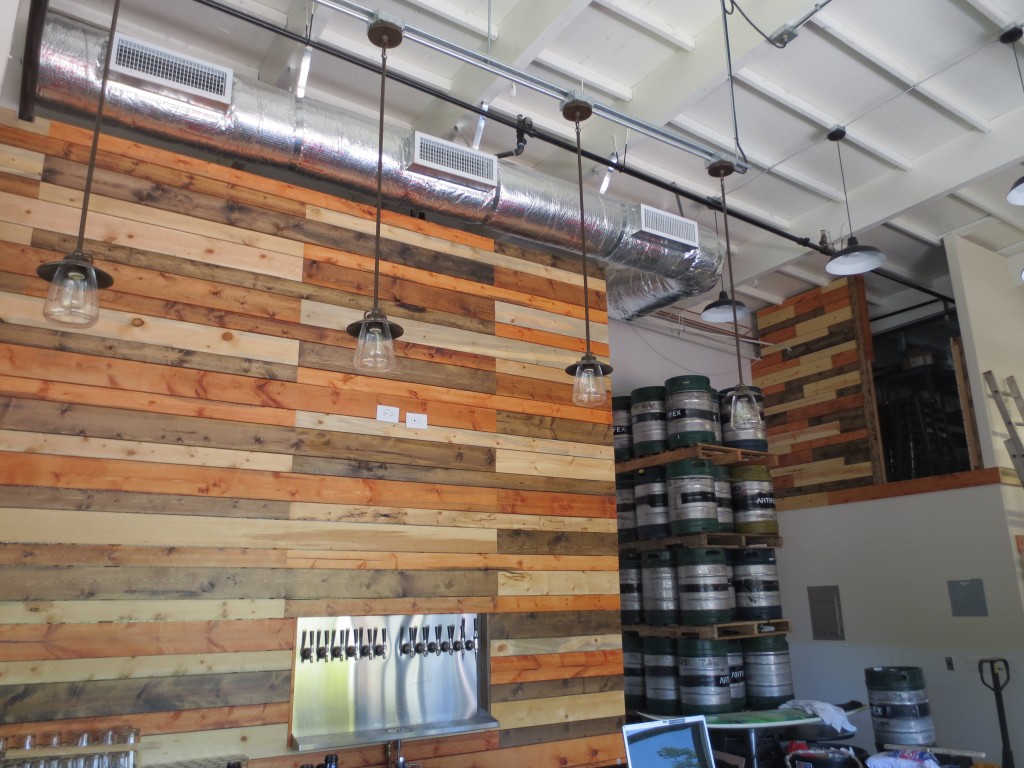 Beautiful wood lines the indoor tasting room walls.