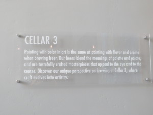 This plaque describes the art theme conception at Cellar 3.
